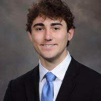 Professional headshot of Anderson Gates